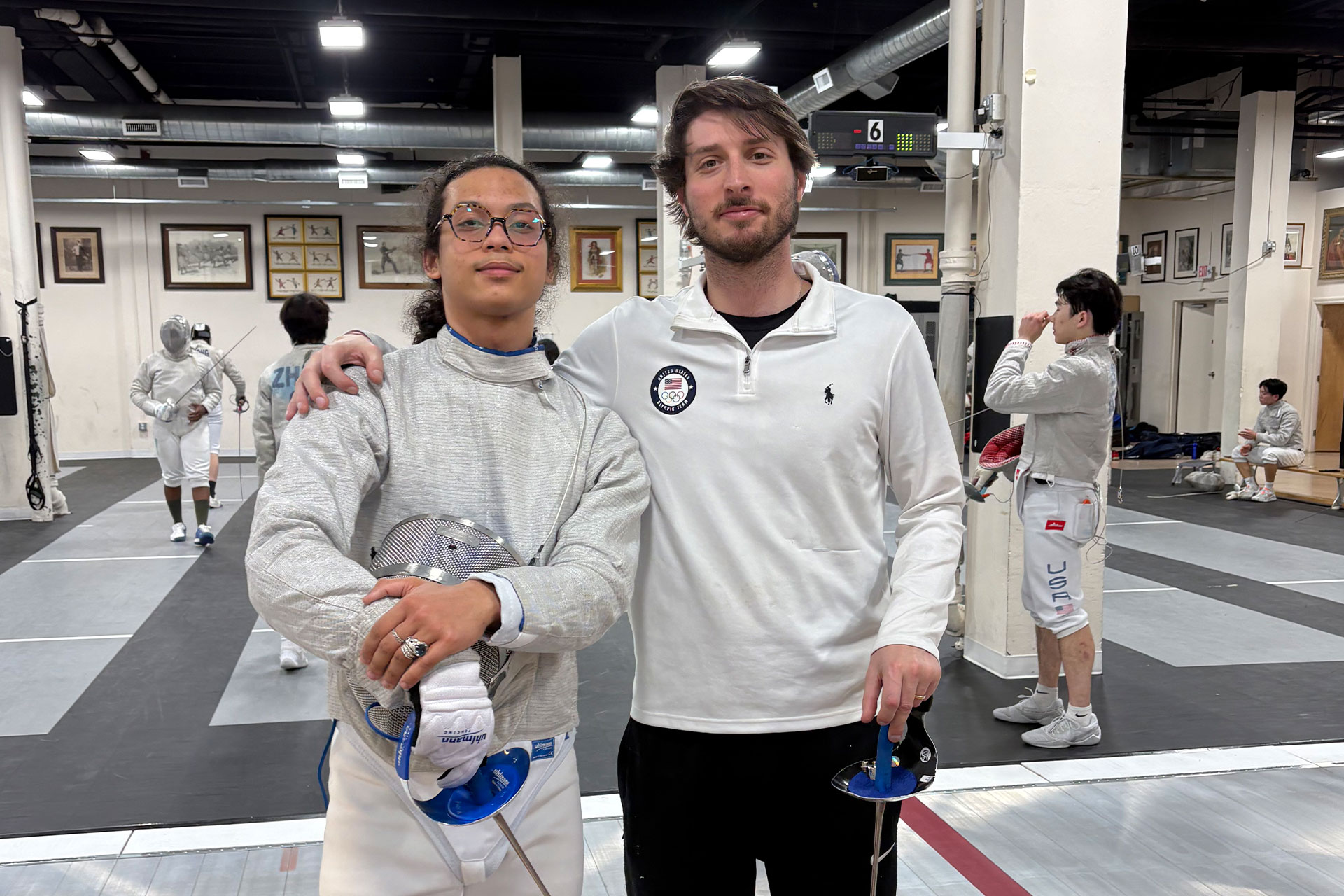 Phoenix Olen with Olympic Fencer Eli Dershwitz